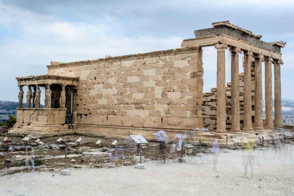 Acropolis - Ancient City overlooking Athens. Discover the rich history and culture of Greece with our travel blog.