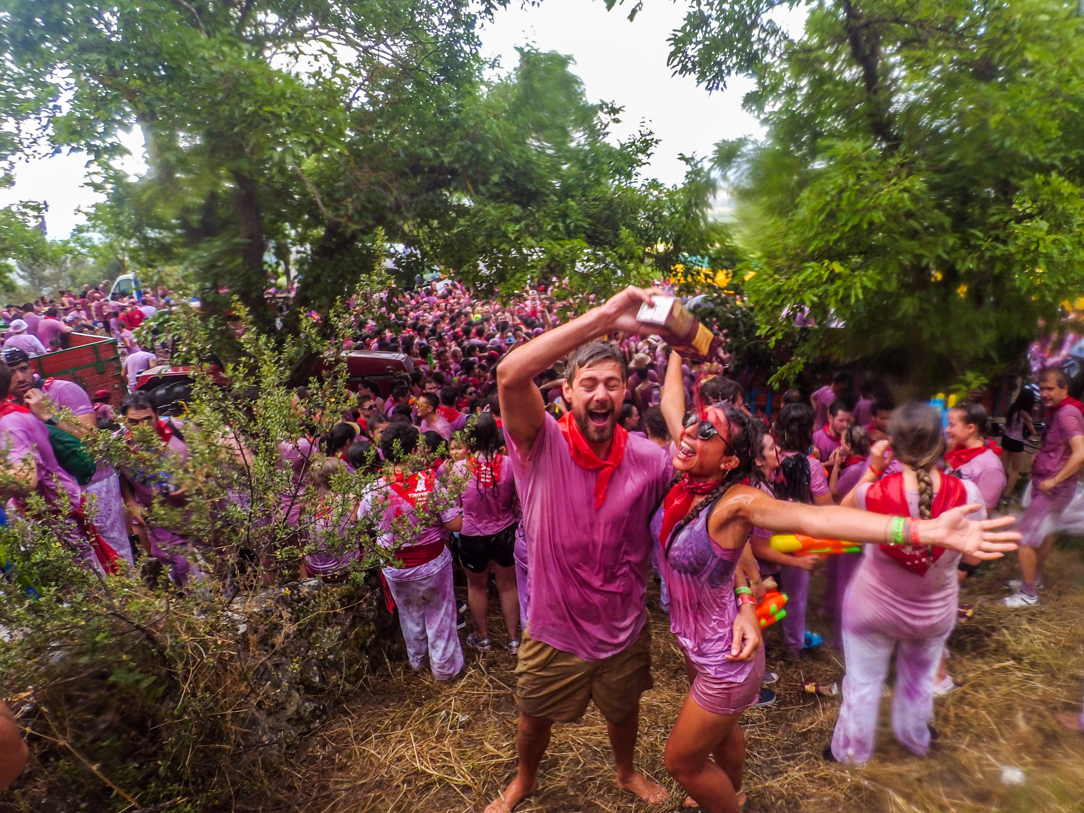 Brett and Bianca covered in red wine at the famous wine fight event in Haro, Spain.