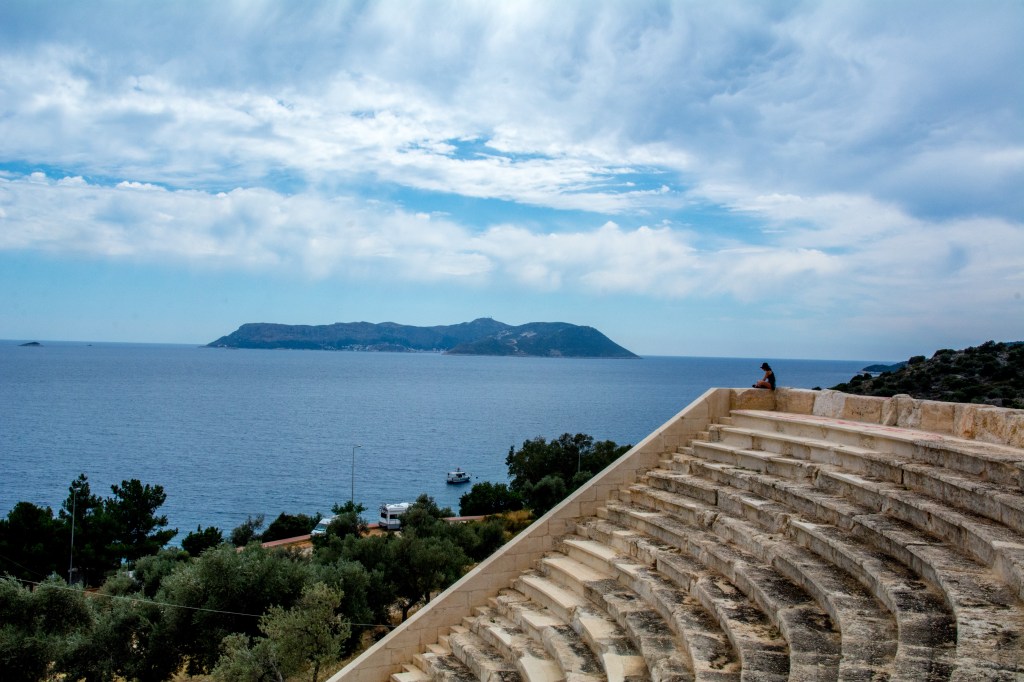 Taking in the stunning view of Olympos, Turkey, from atop an ancient ruin overlooking the beautiful coastline and nearby islands.