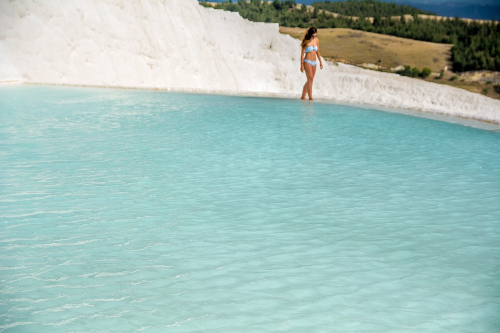 Bianca walking on the travertine terraces of Pamukkale hot springs, Turkey.
