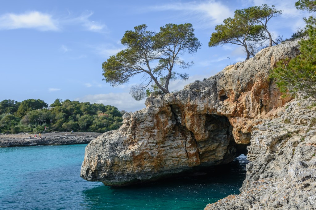 A breathtaking view of the headland in Majorca, Spain, with crystal-clear water and scenic landscape.