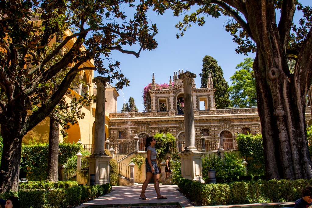 Real Alcazar, Seville's breathtaking palace complex showcasing a stunning blend of Islamic and Christian architectural styles, lush gardens, and rich cultural heritage.