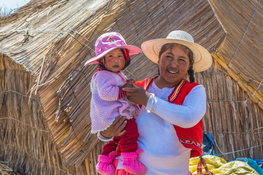 Local people living on the Uros Floating Island in Lake Titicaca.