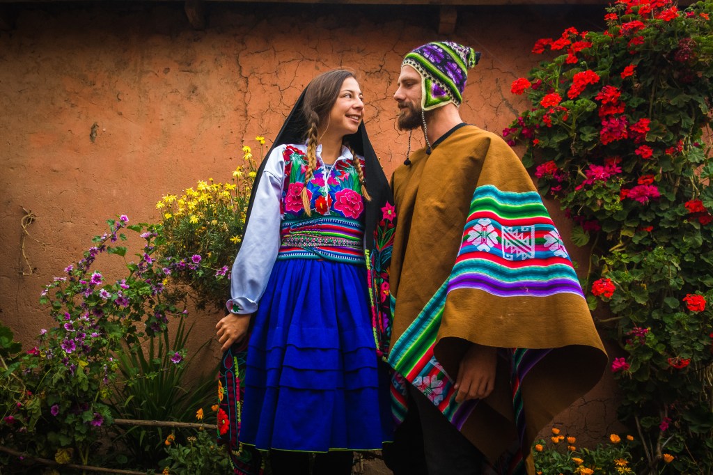 Dressing in local traditional robes for a dinner party experience.