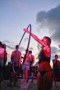 Girl showcasing hula hoop dancing skills at Sunday Funday in Nicaragua.