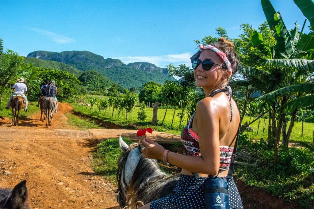 Bianca enjoying horse riding adventure in Vinales, Cuba.