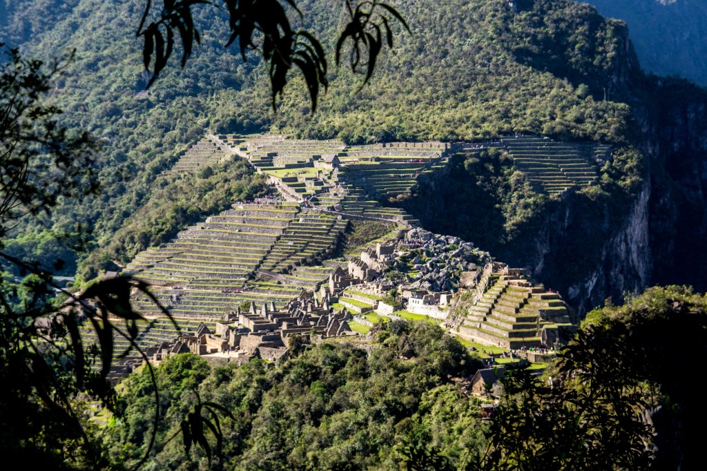 Captivating view of Machu Picchu ruins, Machu Picchu Mountain, and the Urubamba River.