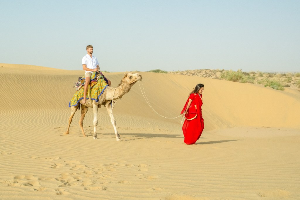 Brett enjoying a camel ride in the magnificent Great Indian Desert, an unforgettable adventure.