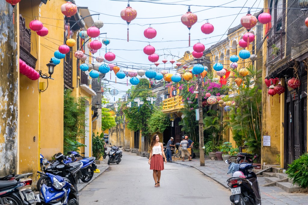 Bianca immersing herself in the charm of Hoi An's streets.