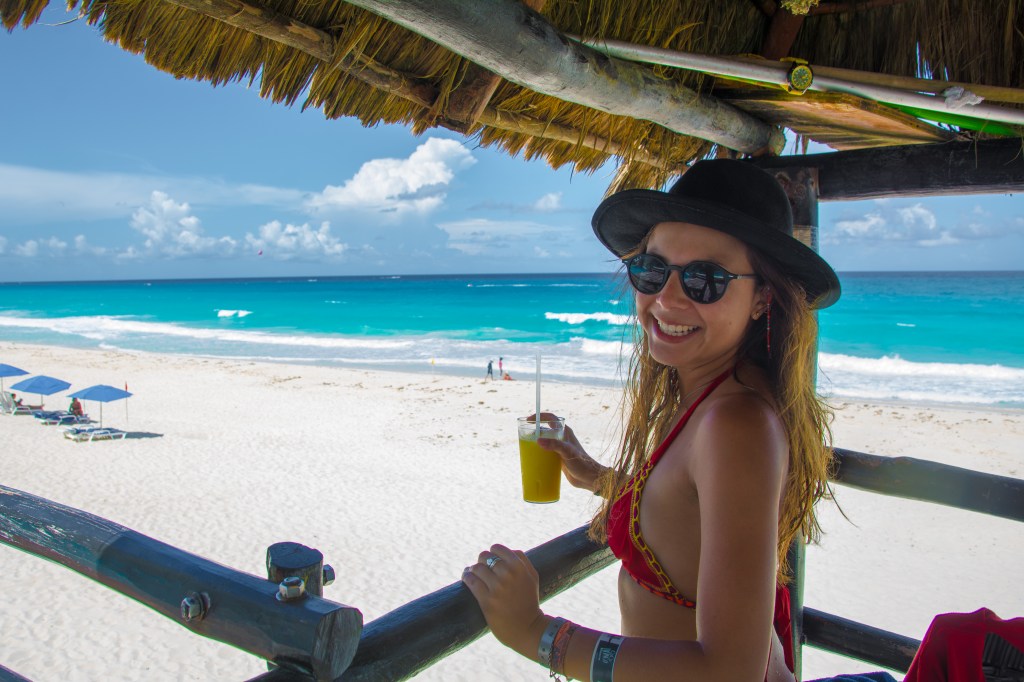 Blissful Moments - Bianca Savoring a Cocktail at Bellevue Beach Paradise.