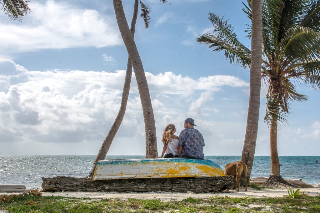 Brett and Bianca Embracing the Relaxed Pace of Caye Caulker - Unwinding in Belizean Tranquility