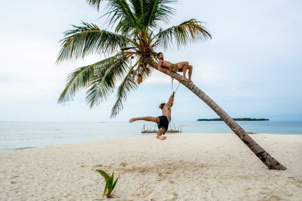 Brett Amidst the Coconut Trees of San Blas Islands' - Join Brett in the lush paradise of the San Blas Islands, where coconut trees abound. Embrace the tropical serenity and natural beauty of this breathtaking destination.
