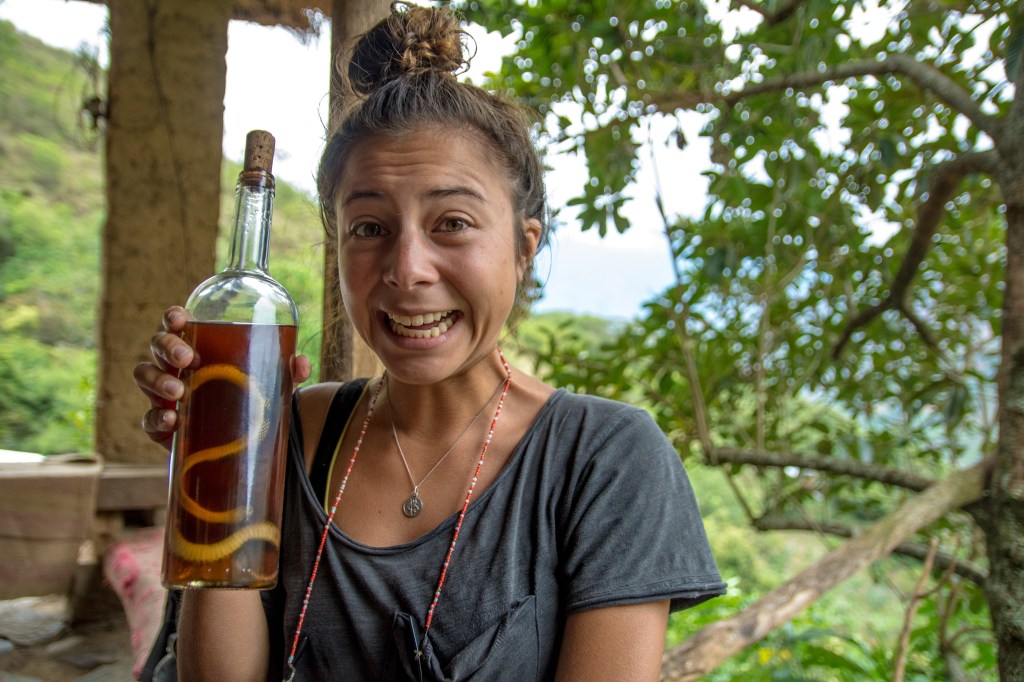 Image capturing Bianca experiencing the local custom of the 'local drop' during their Machu Picchu trek, showcasing cultural exploration and adventure in Peru.