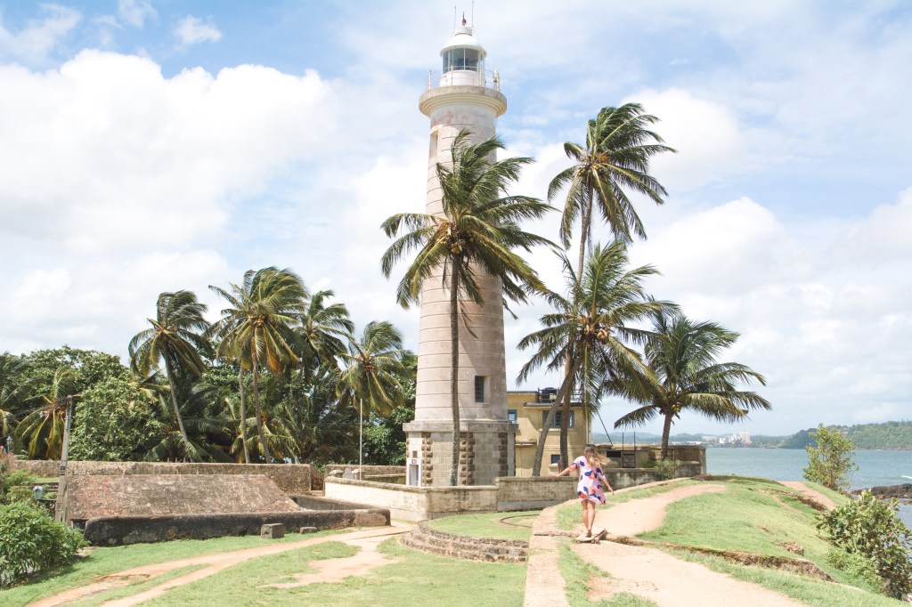 Image featuring Bianca at the iconic lighthouse in Galle Fort, showcasing the historic charm of the landmark in Sri Lanka.
