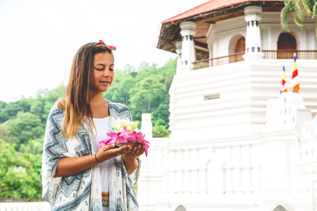 Image showcasing the revered Temple of the Sacred Tooth Relic (Dalada Maligawa) in Kandy, Sri Lanka, a significant Buddhist pilgrimage site housing Lord Buddha's tooth relic.