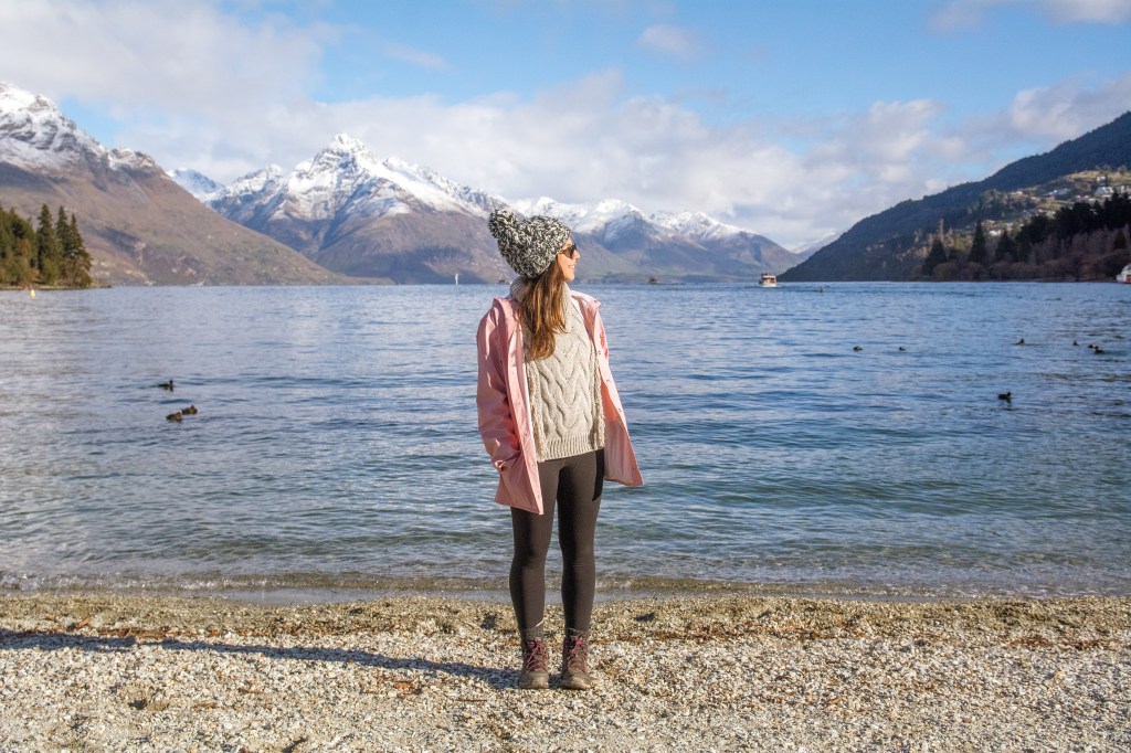 Bianca captivated by the beauty of Lake Wakatipu in Queenstown. Immerse yourself in the stunning lakeside vistas of one of New Zealand's most picturesque destinations.