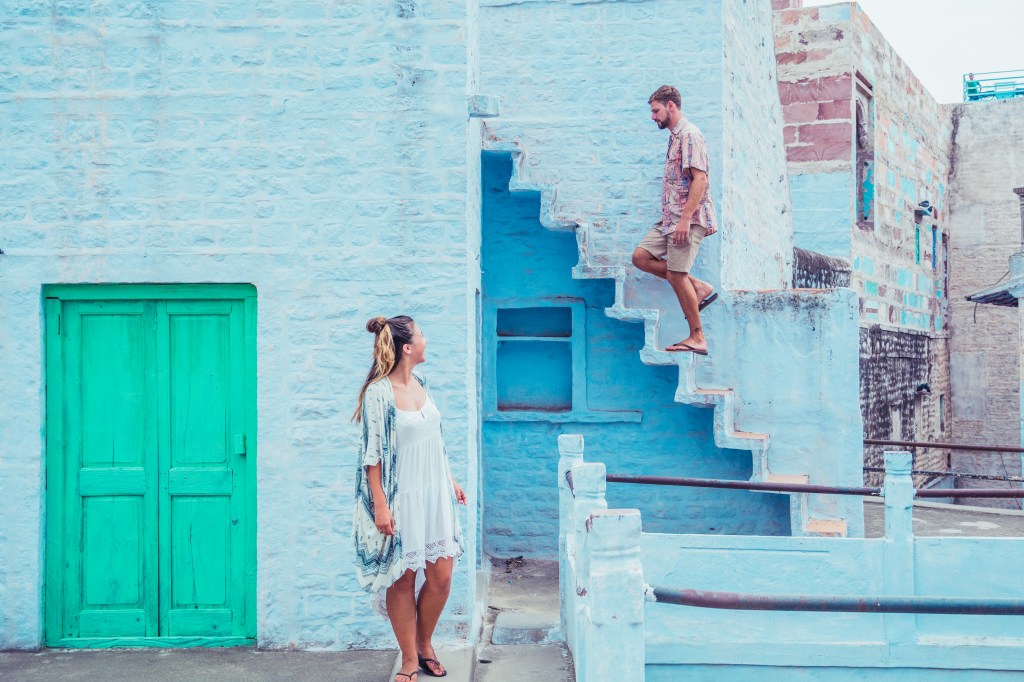 Bianca exploring blue buildings with Fort view in Jodhpur