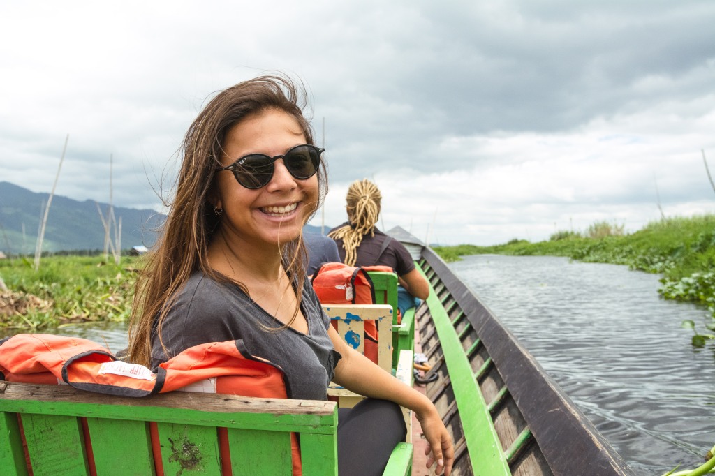 Bianca's Joyful Inle Lake Boat Adventure - Exploring Myanmar's Gem | Join Bianca in the excitement as she sits in a boat, discovering the beauty of Inle Lake. A journey filled with joy, serenity, and breathtaking views.