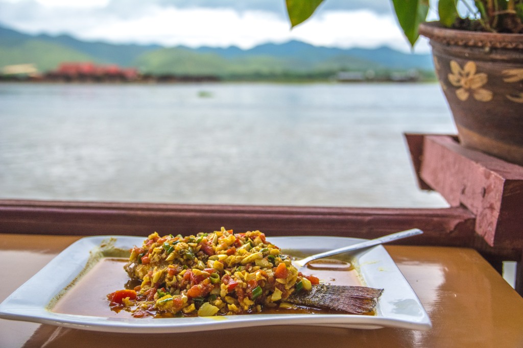 Scenic Boat Tour Culinary Delight - Savoring Delicious Fish Dish on Inle Lake | Dive into culinary bliss with our boat tour, relishing a delectable fish dish at a local Inle Lake restaurant. A taste of authenticity amidst breathtaking waters.