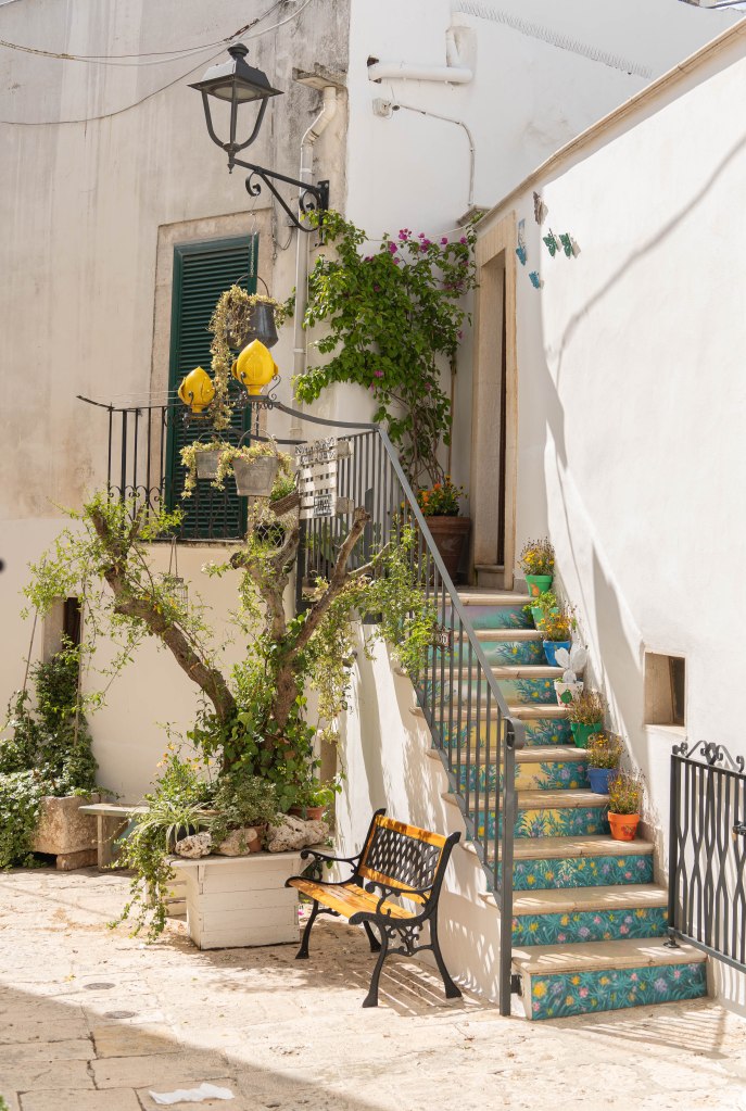 Image of Casa Pinto, a charming pizzeria nestled in the tiny alleyways of Locorotondo, Italy, known for offering some of the best pizza in the region, a delightful culinary experience not to be missed.