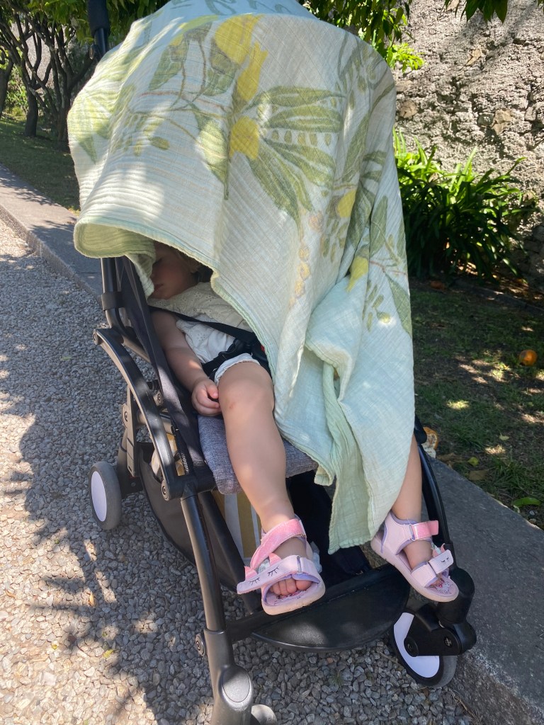Florence sleeping in travel stroller on holiday in Europe
