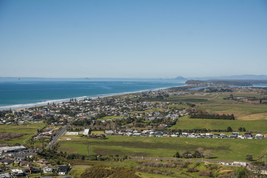 View of Waihi Beach, Coromandel, New Zealand, scenic coastal landscape, beach view