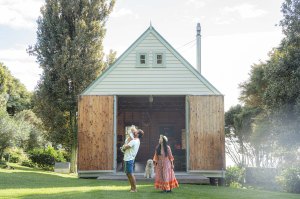 Family enjoying outdoor activities and quality time together at Wainui Seaside Glamping on New Zealand’s coast.