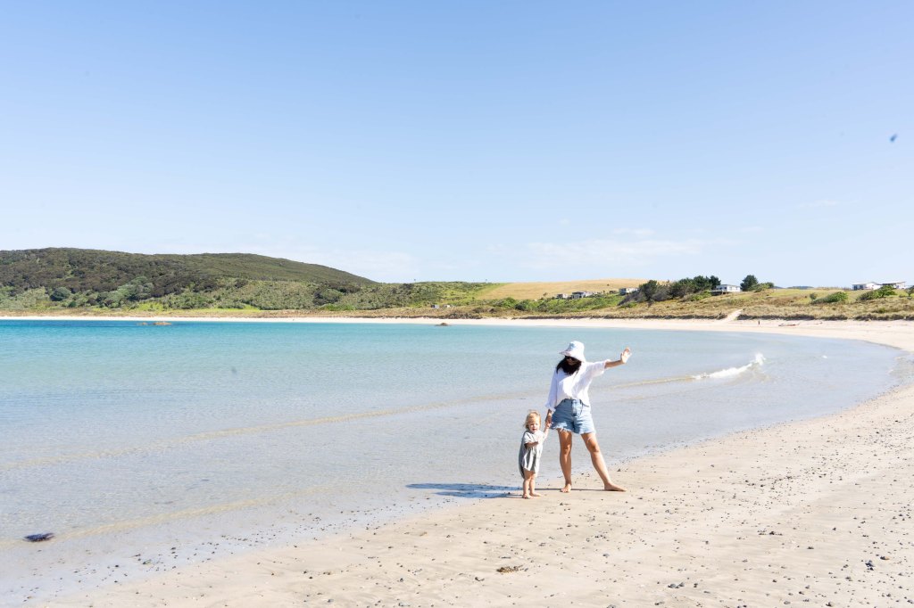Matai Bay on the Karikari Peninsula, Northland New Zealand — one of our favourite Far North beaches with white sand, turquoise water, and stunning coastal views.