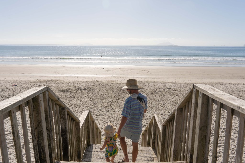 Ruakaka Beach in Northland New Zealand — ideal halfway stop for families traveling from Auckland to the Far North, with golden sand and scenic ocean views.