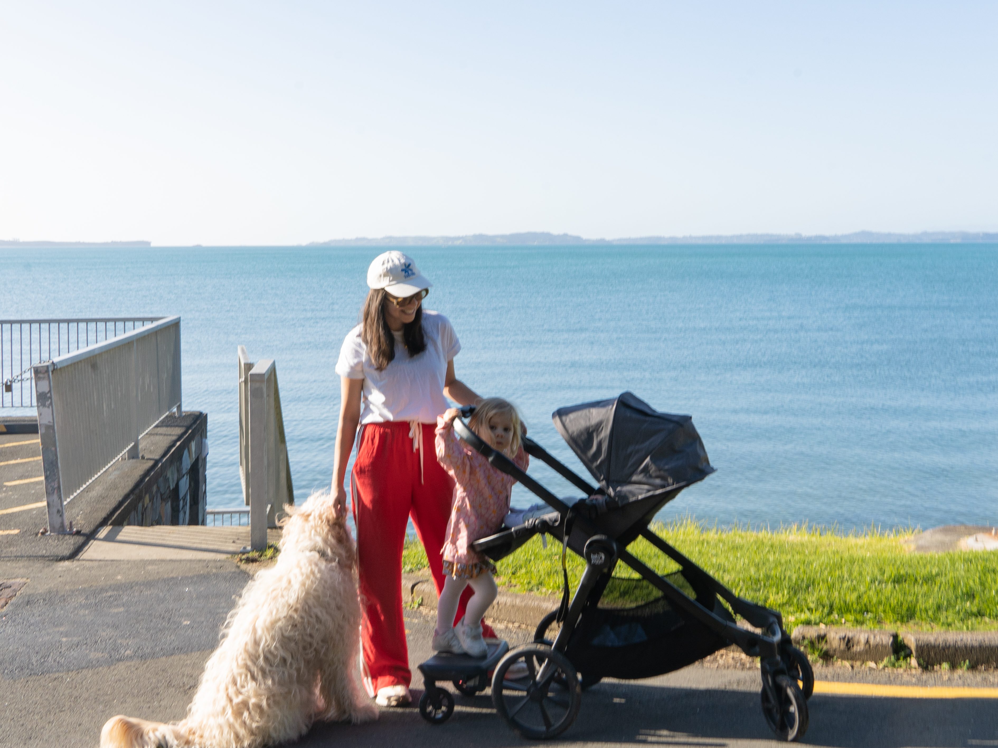 Bianca using the single-seat configuration of the Baby Jogger City Select 2 pram while out on a walk.
