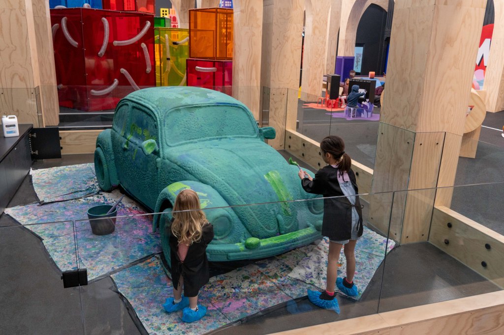 Children enjoying interactive play spaces at MOPA (Museum of Play and Art).