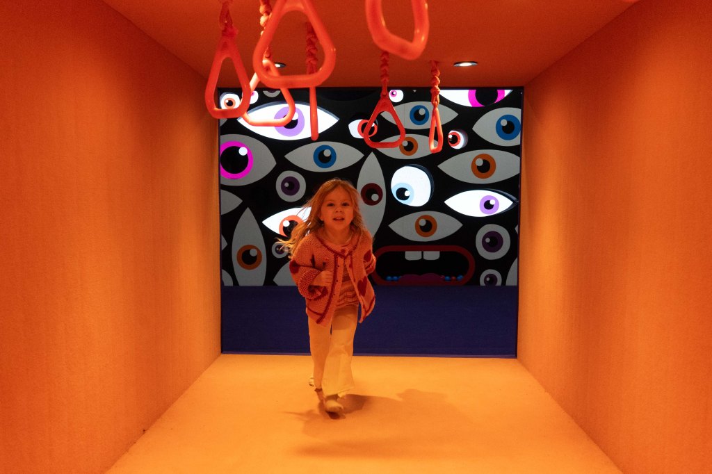 Florence enjoying hands-on play and art activities at MOPA (Museum of Play and Art).