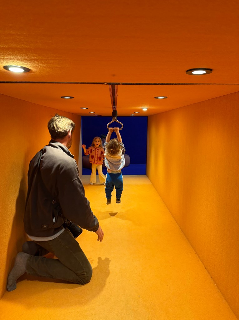 Family enjoying interactive play and creative exhibits at MOPA (Museum of Play and Art).